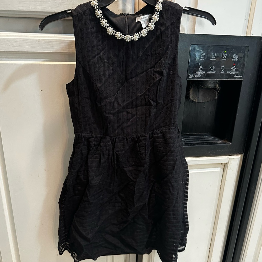 Elegant Black Dress with Pearl Accents